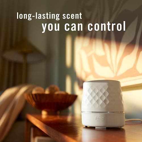 Febreze Plug Scent Booster Starter Kit, Oil Diffuser, Air Freshener Plug in, Continuous Scent Device + 2 Downy Calm Refills thumbnail 2