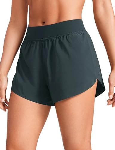CRZ YOGA Mid Waisted Dolphin Athletic Shorts for Women 4" Lightweight High Split for Gym Workout with Liner Quick Dry - Image 1