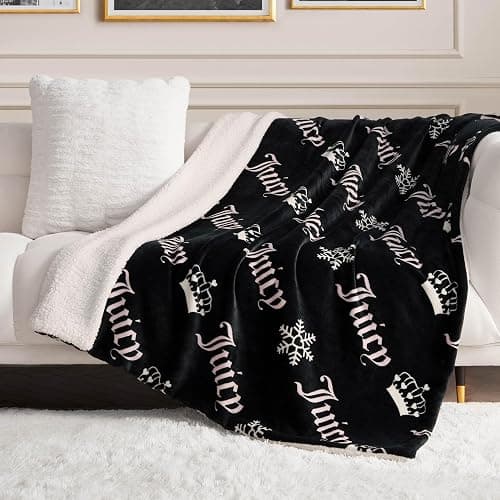 Juicy Couture Plush Reversible Sherpa 50"x60" Throw Blanket, Black Diagonal - Image 1