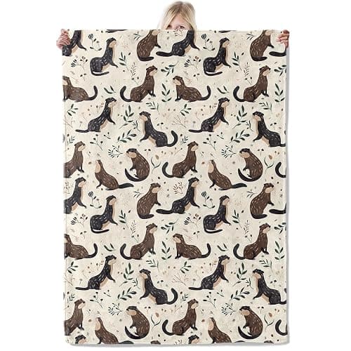 ICAAV Cute Otter Blanket 50×60 Inch,Minimalist Hand-Drawn Style Lightweight Flannel Throw with Brown and Black Otters Among Leaves, Nature Animal Decor,Gifts for Adults, Teens - Image 1