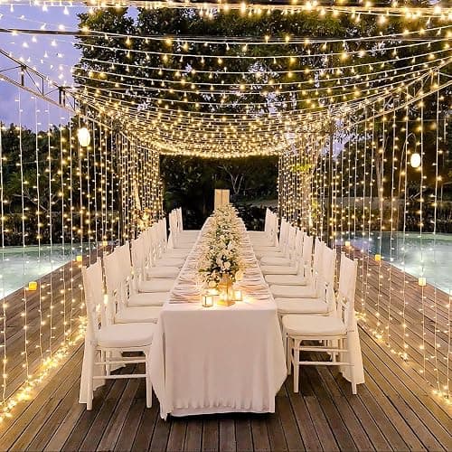 JMEXSUSS 300 LED Remote Control Christmas Curtain Lights, Plug in Fairy Curtain Lights Outdoor, Window Wall Hanging String Lights for Bedroom Backdrop Wedding Party Indoor Patio Xmas Decor, Warm White thumbnail 8