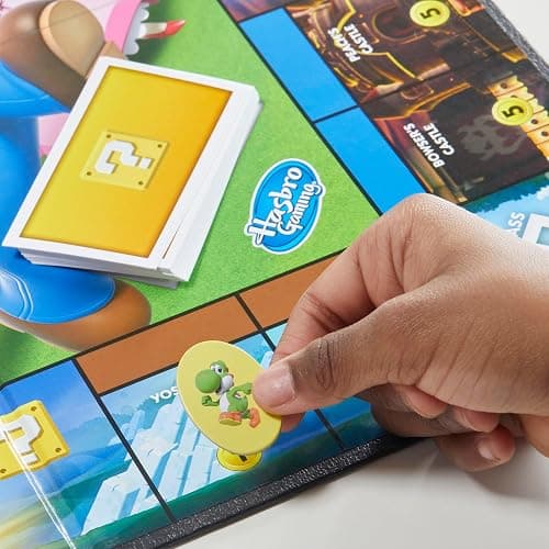 Monopoly Junior Super Mario Edition Board Game, Fun Kids' Ages 5 and Up, Explore The Mushroom Kingdom as Mario, Peach, Yoshi, or Luigi (Amazon Exclusive) thumbnail 7