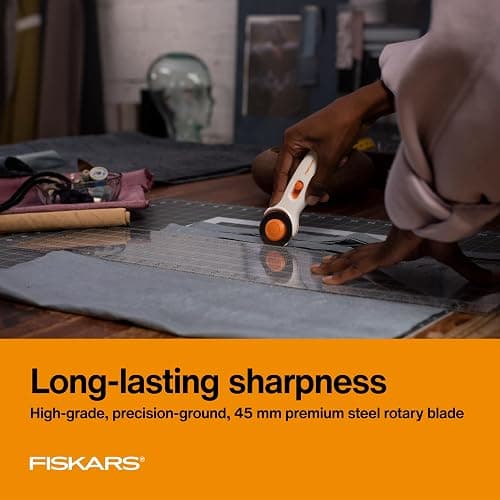 Fiskars 45mm Rotary Cutter for Fabric, Premium Steel Stick Fabric Cutter Cuts Through Multiple Layers, Right and Left Handed, Easy and Safe Blade Change, Arts and Crafts, Sewing and Quilting Tools thumbnail 6