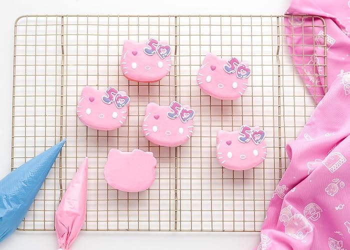 Handstand Kitchen Hello Kitty Commemorative 50th Anniversary Silicone Cupcake Mold Featuring Limited Edition Bow Detail & Pink Color thumbnail 2