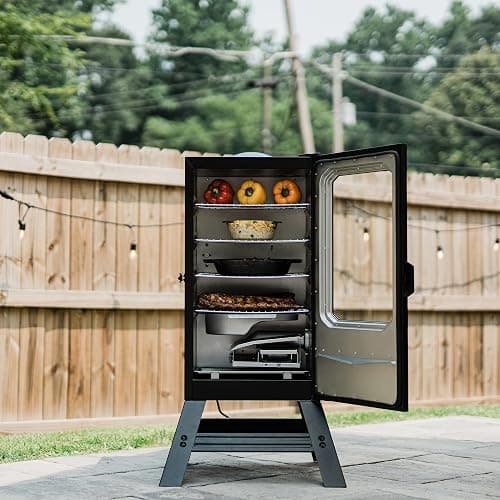 Masterbuilt® 30-inch Digital Electric Vertical BBQ Smoker with Leg Kit, Side Wood Chip Loader and 710 Cooking Square Inches in Black, Model MB20070421 thumbnail 2