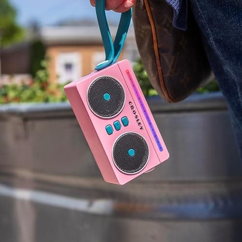 Crosley CR3050A-FG Mini Boombox Portable Bluetooth Speaker, Flamingo | Bluetooth In, 5 Color-Changing Light Modes, LED Lights Sync with Music, Rechargeable Lithium-Ion Battery thumbnail 7