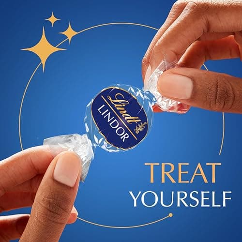 Lindt LINDOR Cookies and Creme White Chocolate Candy Truffles with Smooth, Melting Truffle Center, 25.4 oz., 60 Count thumbnail 5