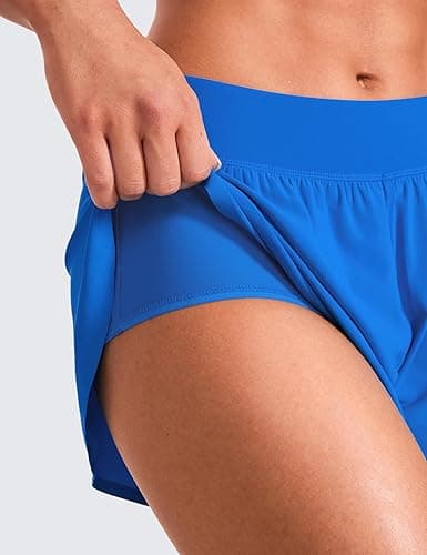 CRZ YOGA Mid Waisted Dolphin Athletic Shorts for Women 4" Lightweight High Split for Gym Workout with Liner Quick Dry - Medium - Sparkle Blue thumbnail 5