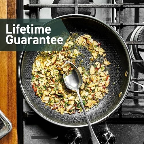 HexClad Hybrid Nonstick 18-Piece Cookware Set, 2, 3, and 8Qt Pots with Lids, 2 Silicone Trivets, 8", 10", and 12" Pans with Lids, 7Qt Chicken Fryer with Lid, and 14" Wok with Lid, Stay-Cool Handles thumbnail 8