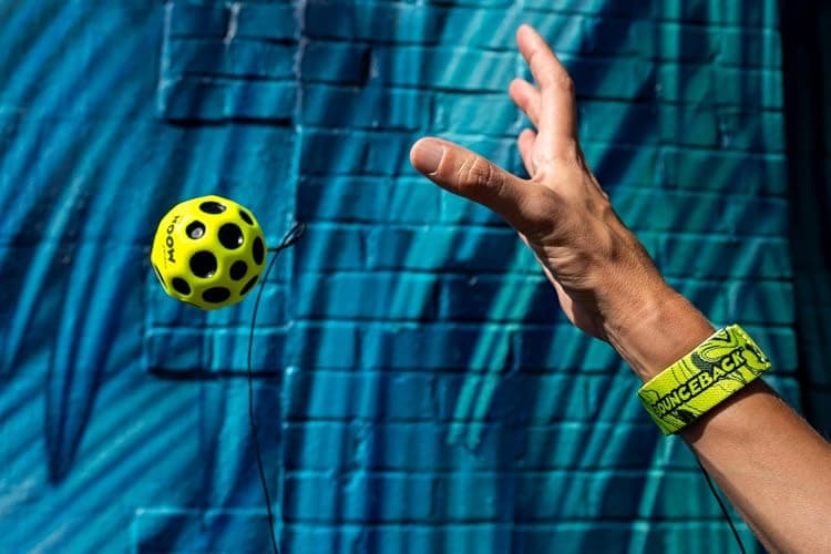 Waboba Bounceback Returning Yellow Moon Ball Hyper Bouncy Balls, Extreme Bounce and Fun, Super High Bouncing Ball for Active Play and Outdoor Games thumbnail 2
