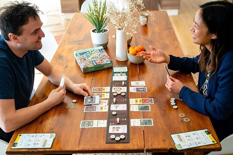 Caper Europe | Strategic Two-Player Board Game for Ages 10+ | Fast-Paced Card Drafting Heist Across Europe | Travel-Friendly Box with Stunning Art | Perfect for Couples and Family Game Night thumbnail 2