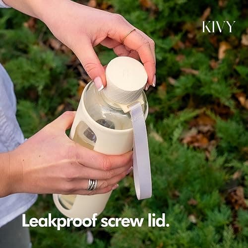 KIVY Glass Water Bottle with Silicone Sleeve 32 oz [WITH MEASUREMENT] - Borosilicate Glass Water Bottle Screw Top - Clear Bottles with Measurement Marking - Slim Waterbottle Aesthetic - Cream White - 32 Ounces - Cream White thumbnail 2
