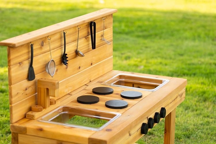 Noble Toys XL Cedar Outdoor Mud Kitchen Centered with Backsplash and Stovetop for Toddlers Kids | Pretend Play Table | Sensory Table | Outside Playset | Real Wooden Kitchens | Preschool Equipment thumbnail 6