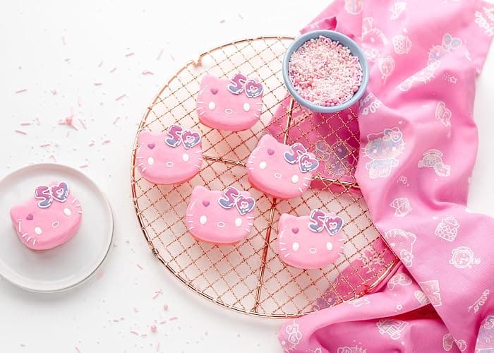Handstand Kitchen Hello Kitty Commemorative 50th Anniversary Silicone Cupcake Mold Featuring Limited Edition Bow Detail & Pink Color thumbnail 5