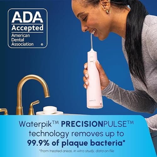 Waterpik Cordless Pulse Rechargeable Portable Water Flosser for Teeth, Gums, Braces Care and Travel with 2 Flossing Tips, Waterproof, ADA Accepted, WF-20 Pink, Packaging May Vary thumbnail 3
