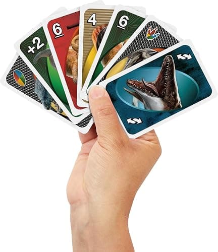Mattel Games UNO Jurassic World Rebirth Card Game in a Collectible Tin for Kids, Adults & Family with Special Rule & Images Inspired by The Movie thumbnail 2