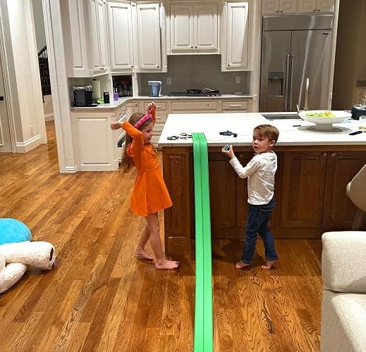 Valchemist FlexTrack 5000 Flexible Race Car Track for Kids Toy with Suction Cups Compatible with Hot Wheels and Diecast 1/64th Cars and More 15 Feet Long Rolls Up Portable Racetrack (Electric Green) thumbnail 7