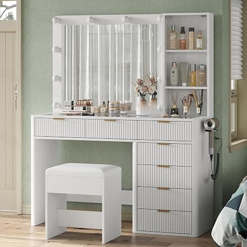 Yanosaku 47" Fluted Vanity Desk with Mirror & LED Lights, 7-Drawer Makeup Vanity with Glass Top & Cabinet, Vanity with Chair & Charging Station, 3 Lighting Modes, for Bedroom, White - Image 1