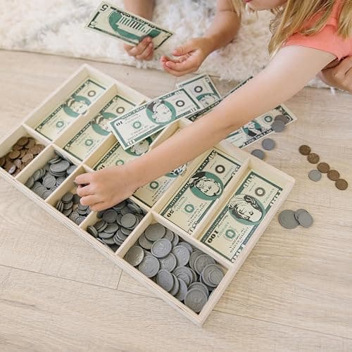 Melissa & Doug Play Money Set - Educational Toy with Paper Bills and Plastic Coins (50 of Each Denomination) and Wooden Cash Drawer for Storage thumbnail 2