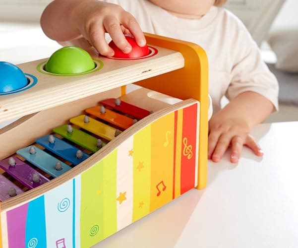 Hape Pound & Tap Bench with Slide Out Xylophone - Award Winning Durable Wooden Musical Pounding Toy for Toddlers thumbnail 5