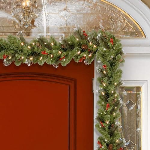 National Tree Company 9 ft Pre-Lit Crestwood Spruce Artificial Christmas Garland, Christmas Decoration with Glitter, Pinecones, Red Berries, 50 Clear Lights, 180 Tips, Green thumbnail 3