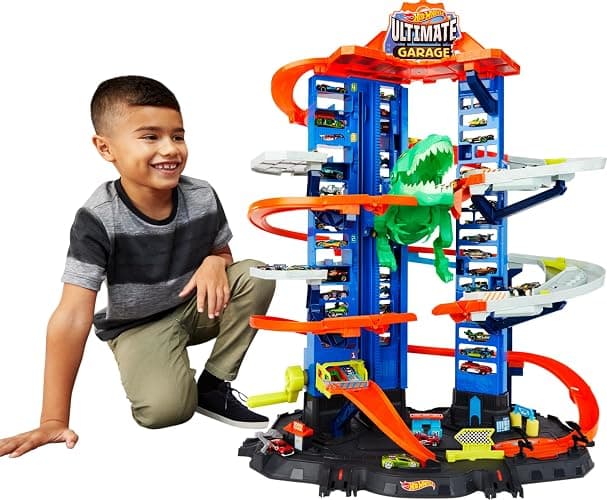 Hot Wheels Ultimate Garage Track Set with 2 Toy Cars, Hot Wheels City Playset with Multi-Level Side-by-Side Racetrack, Moving T-Rex Dino & Storage for 100+ 1:64 Scale Vehicles (Amazon Exclusive) - Image 1