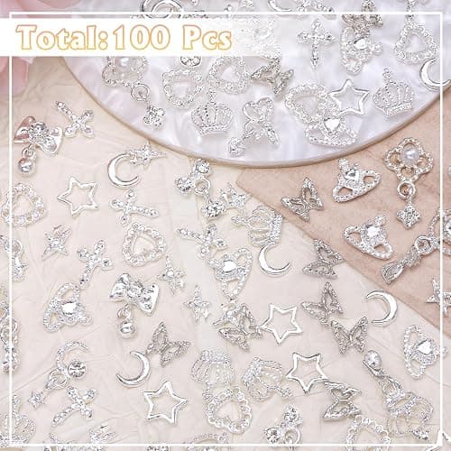 100 Pcs Silver Nail Charms and Gems, Silver Dangle Star Bows Nail Gems Charms, Metal Crown Heart Butterfly Charms for Acrylic Nail Art Alloy Cross Nail Charms for Women DIY Accessories thumbnail 3