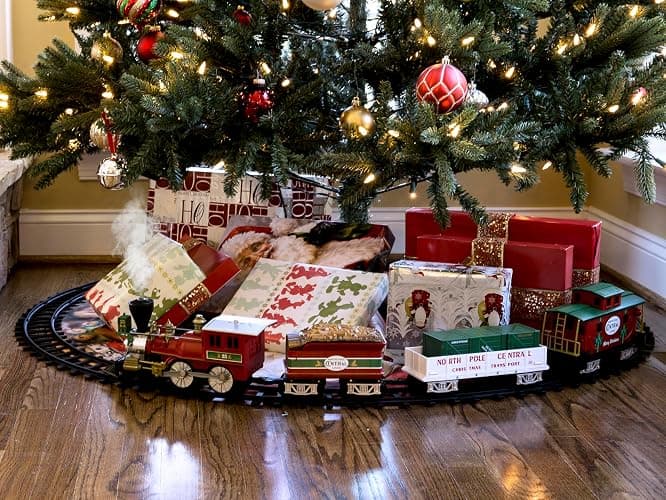 Lionel Battery-Operated North Pole Central Freight Toy Train Set with Bluetooth, Locomotive, Train Cars, & Track with Authentic Train Sounds, Lights, & Water Vapor Smoke Effects for Kids 4+ thumbnail 6