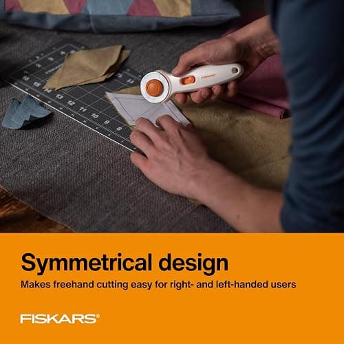 Fiskars 45mm Rotary Cutter for Fabric, Premium Steel Stick Fabric Cutter Cuts Through Multiple Layers, Right and Left Handed, Easy and Safe Blade Change, Arts and Crafts, Sewing and Quilting Tools thumbnail 5