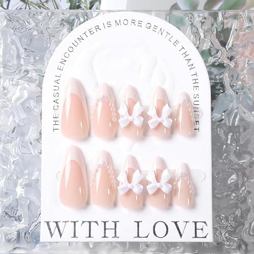 24Pcs White French Tip Almond Medium Fake Nails with Cute Bow Charms Design Nude Pink Acrylic Nails White Pearls Bow Full Cover Glue on Nails Glossy Stick on Nails Heart Artificial Nails for Women thumbnail 3