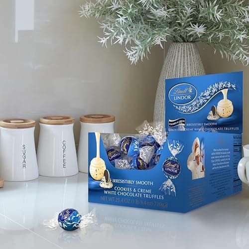Lindt LINDOR Cookies and Creme White Chocolate Candy Truffles with Smooth, Melting Truffle Center, 25.4 oz., 60 Count thumbnail 2