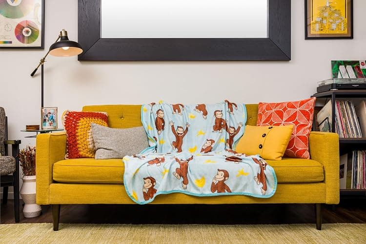 Silver Buffalo Curious George Monkey Banana 45" x 60" Fleece Throw, Soft and Cozy Blanket, 185 GSM thumbnail 2