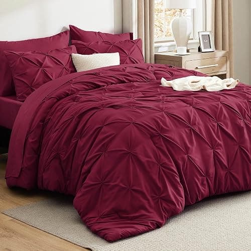 Bedsure Queen Comforter Set Dark Red - Bed in a Bag Queen Size Bedding 7 Pieces, GentleSoft™ Pintuck Bed Set Gift for Family, Pinch Pleat All Season Comforter with Sheets, Pillowcases & Shams - Image 1