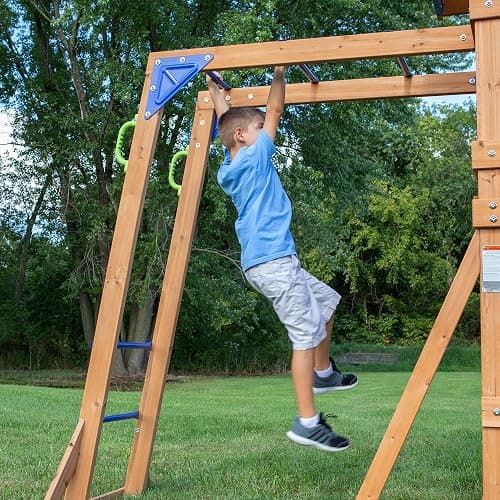 Backyard Discovery Beach Front All Cedar Wooden Swing Set with Monkey Bars, Large Upper Deck with Canopy, Ships Wheel, Play Telescope, Sandbox, Snack Bench, Rock Wall thumbnail 4