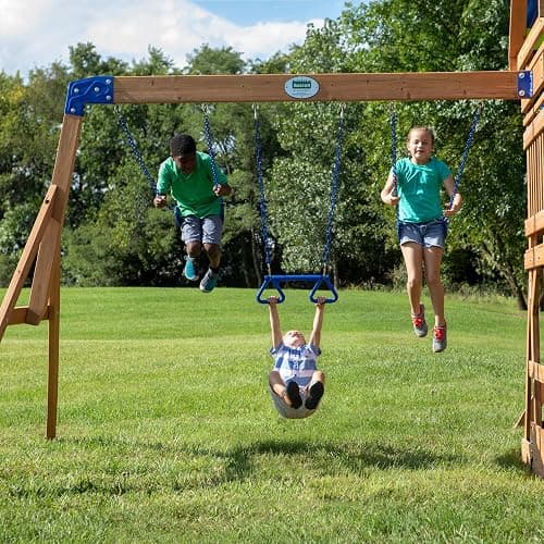 Backyard Discovery Beach Front All Cedar Wooden Swing Set with Monkey Bars, Large Upper Deck with Canopy, Ships Wheel, Play Telescope, Sandbox, Snack Bench, Rock Wall thumbnail 7