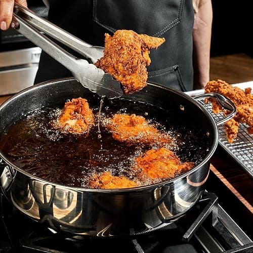 HexClad Hybrid Nonstick 7-Quart Sauté Pan with Tempered Glass Lid, Chicken Fryer, Stay-Cool Handles, Dishwasher-Friendly, Oven-Safe Up to 900°F, Induction Ready, Compatible with All Cooktops thumbnail 2