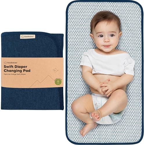 KeaBabies Portable Diaper Changing Pad, Easy Wipe Clean - Foldable Waterproof Baby Changing Mat for Diaper Bag, Compact, Lightweight, 25x13 Newborn, Infant, Baby Changer Travel Essential (Navy Blue) - Image 1