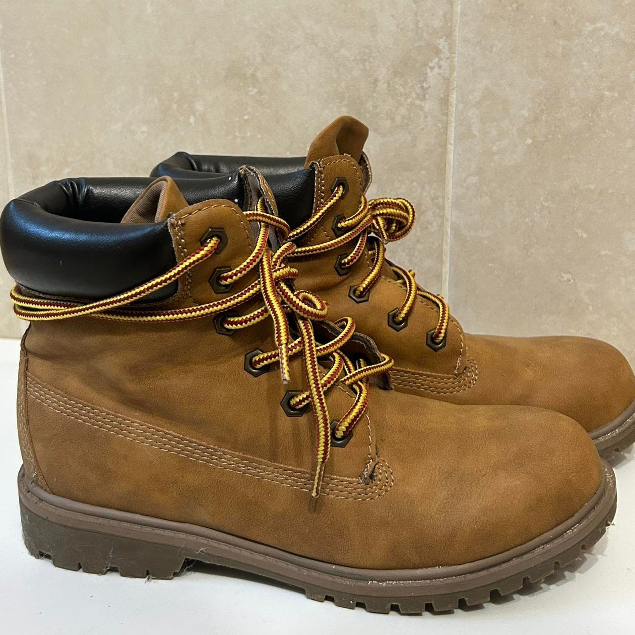 Unionbay brown and yellow hiking and snow boots 

-... thumbnail 4
