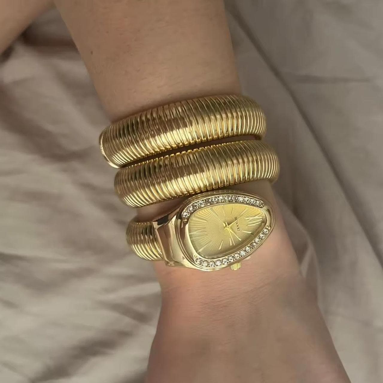 Gold snake watch that wraps around your wrist this... thumbnail 5