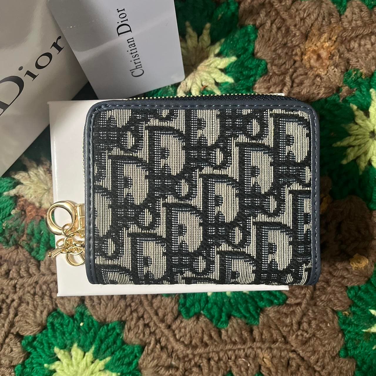 Dior Oblique Jacquard Charm Zip Wallet Blue
Brand... - Image 1