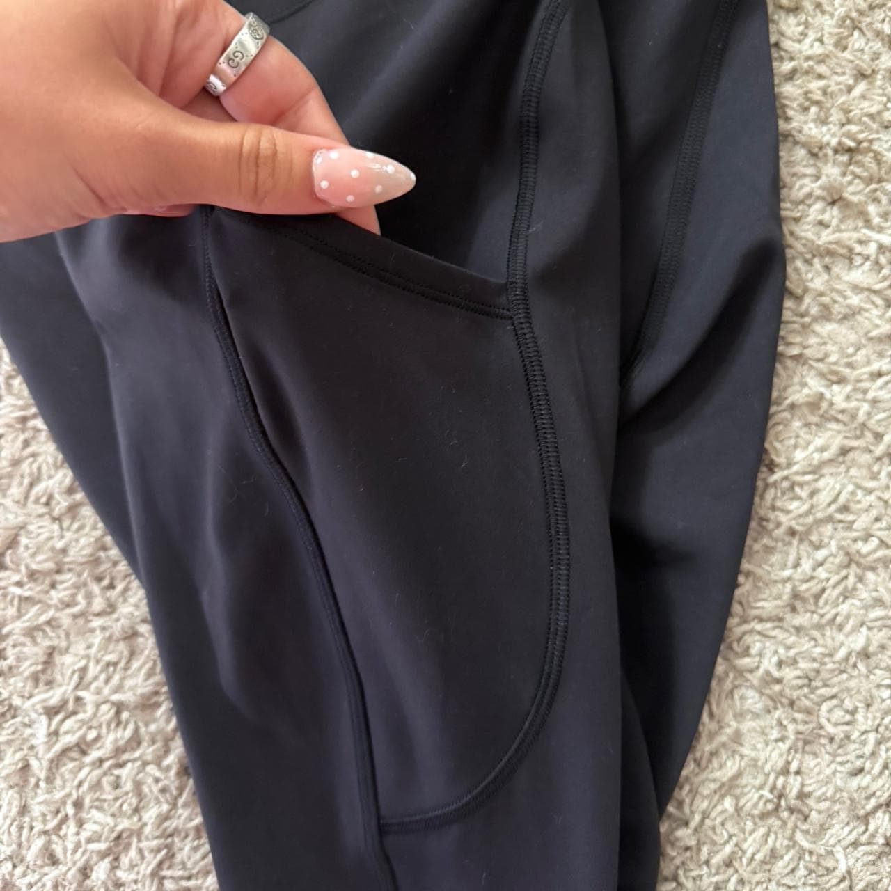 Black lulu lemon leggings with pockets on the sides... thumbnail 3