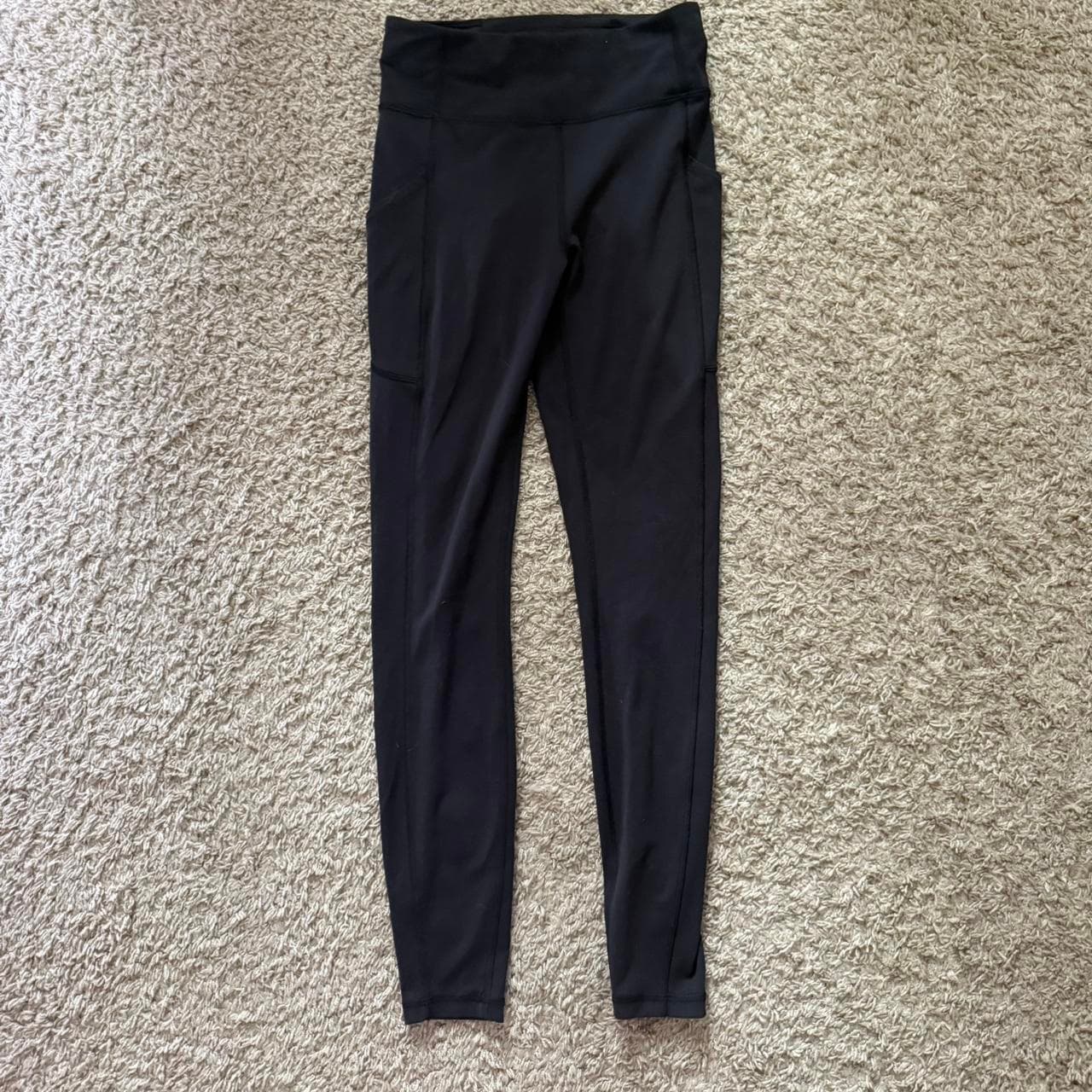 Black lulu lemon leggings with pockets on the sides... thumbnail 4