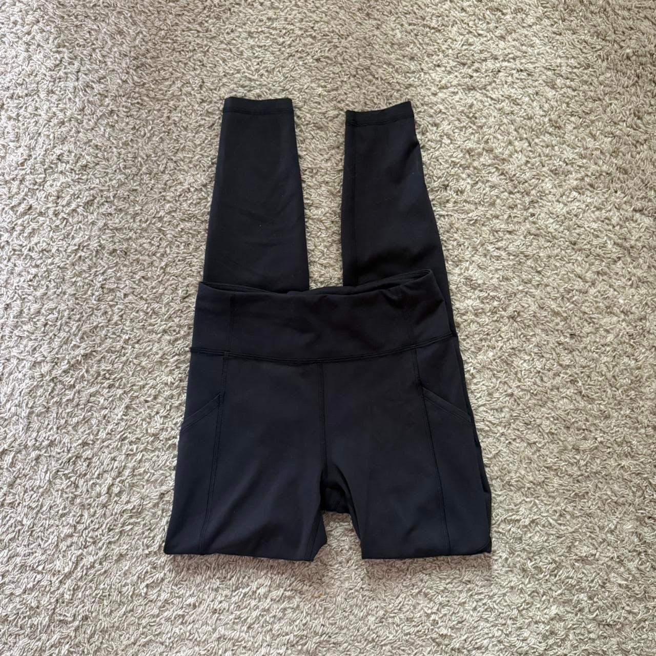 Black lulu lemon leggings with pockets on the sides...