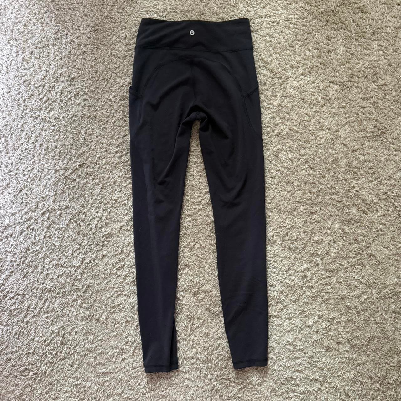 Black lulu lemon leggings with pockets on the sides... thumbnail 2