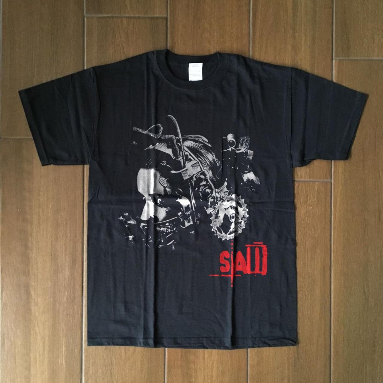 saw t shirt

100% cotton

brand new gildan heavy... - Image 1
