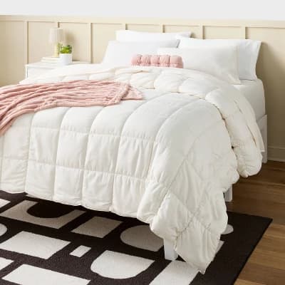 Puffer Bolster Decorative Throw Pillow Light Pink - Room Essentials™ - Image 1