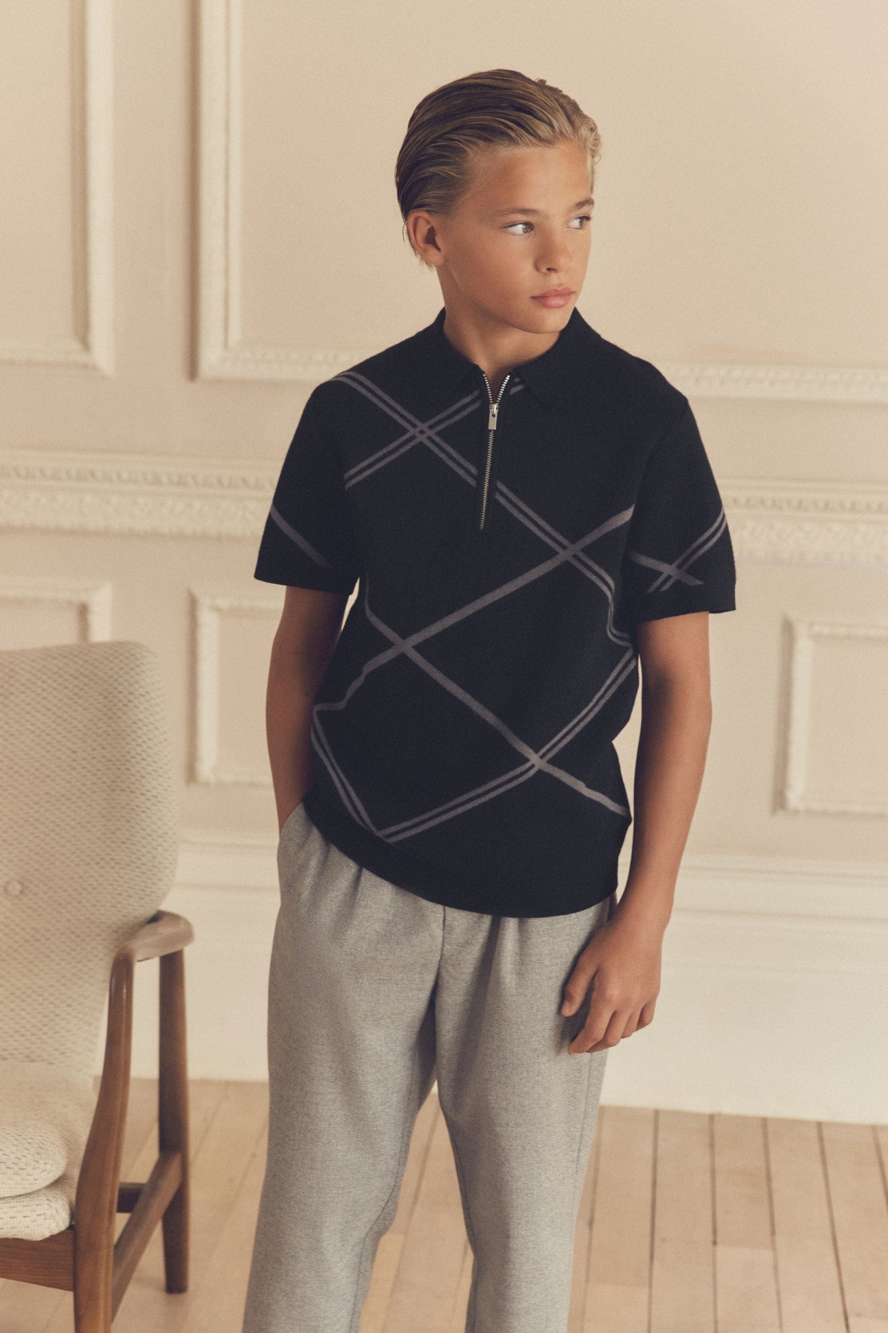 Black Argyle Knitted Zip Neck Polo Shirt (3-16yrs) - Image 1