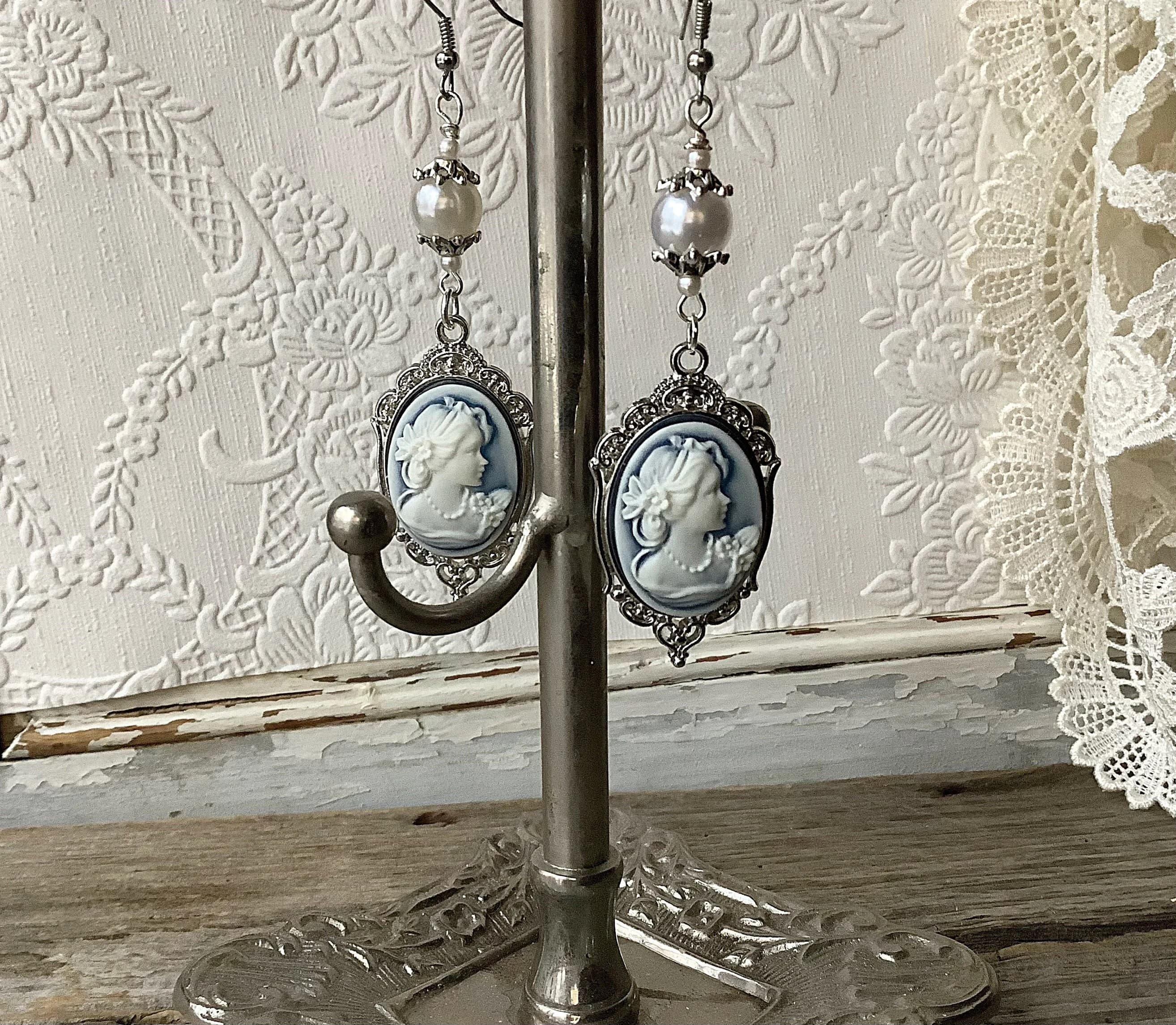 Pearl earrings, cameo earrings, blue cameo earrings https://www.etsy.com/listing/1159889187/pearl-earrings-cameo-earrings-blue-cameo?click_key=edf44b2705dccaf2675977dd7526ac815f9bdb07%3A1159889187&click_sum=b9bfca5a&ref=shop_home_recs_2&pro=1&sts=1 - Image 1