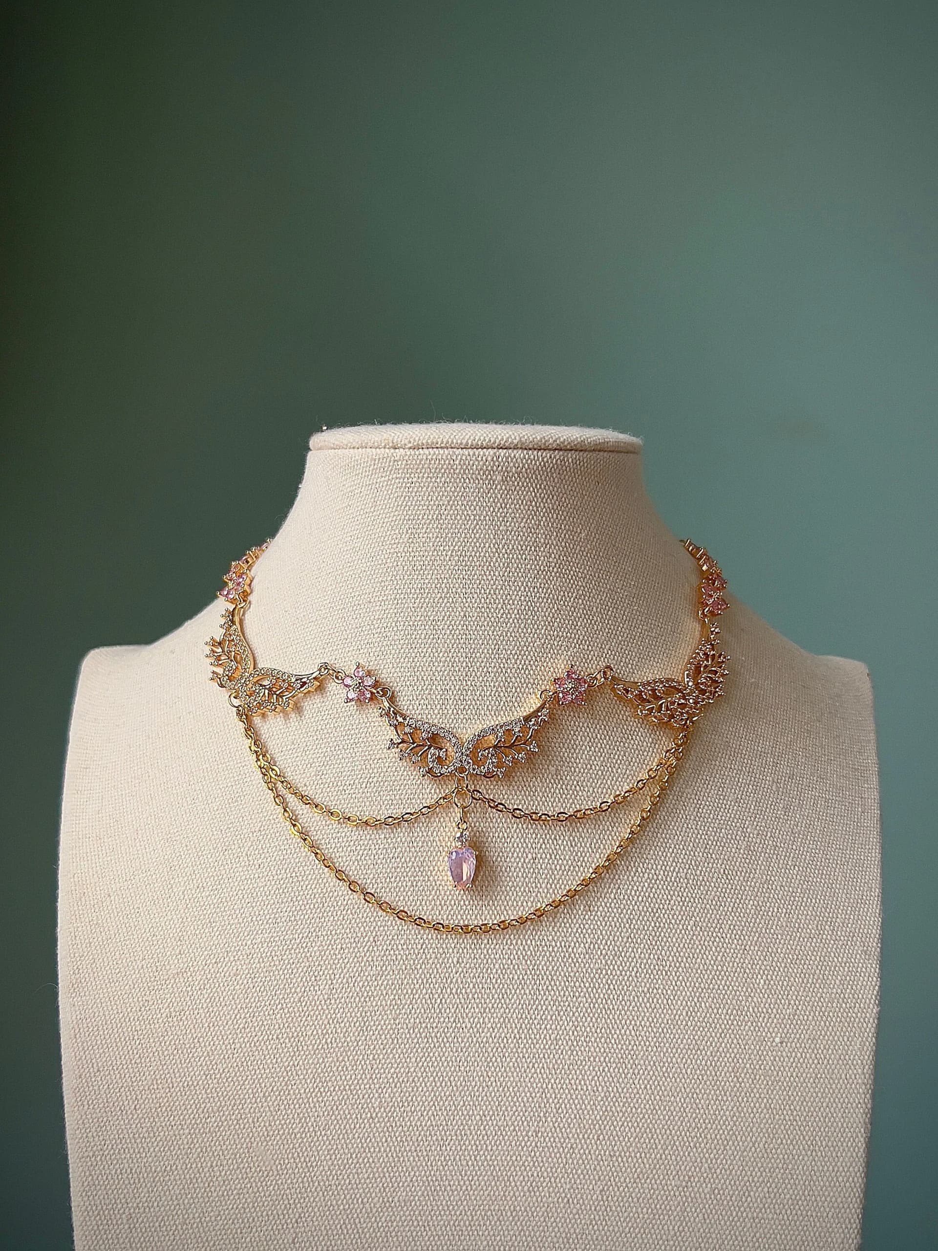 Dreamy pink flower choker necklace with fairy wings and teardrop, Regal gold fairycore angelic jewelry, Kawaii coquette cosplay pendant - Image 1