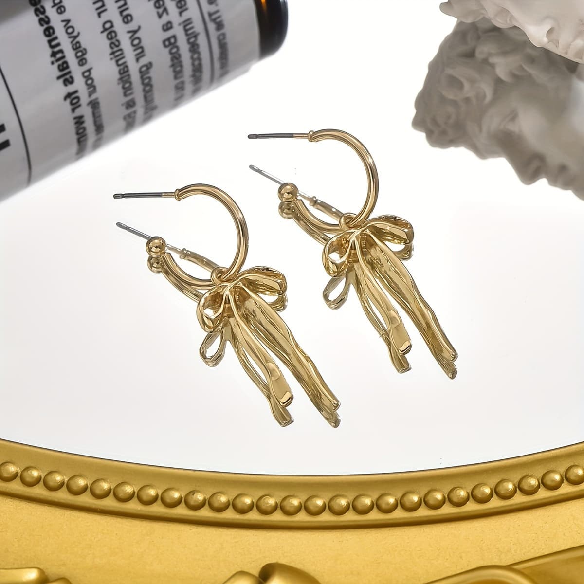 A Fashionable 18K Gold-Plated Bow Earring with a Golden Bow Design | Women'S Sweet Style | Perfect Choice for Daily Wear And Party Accessories | Low Allergy Stainless Steel | Women'S Fashion Jewelry - Image 1